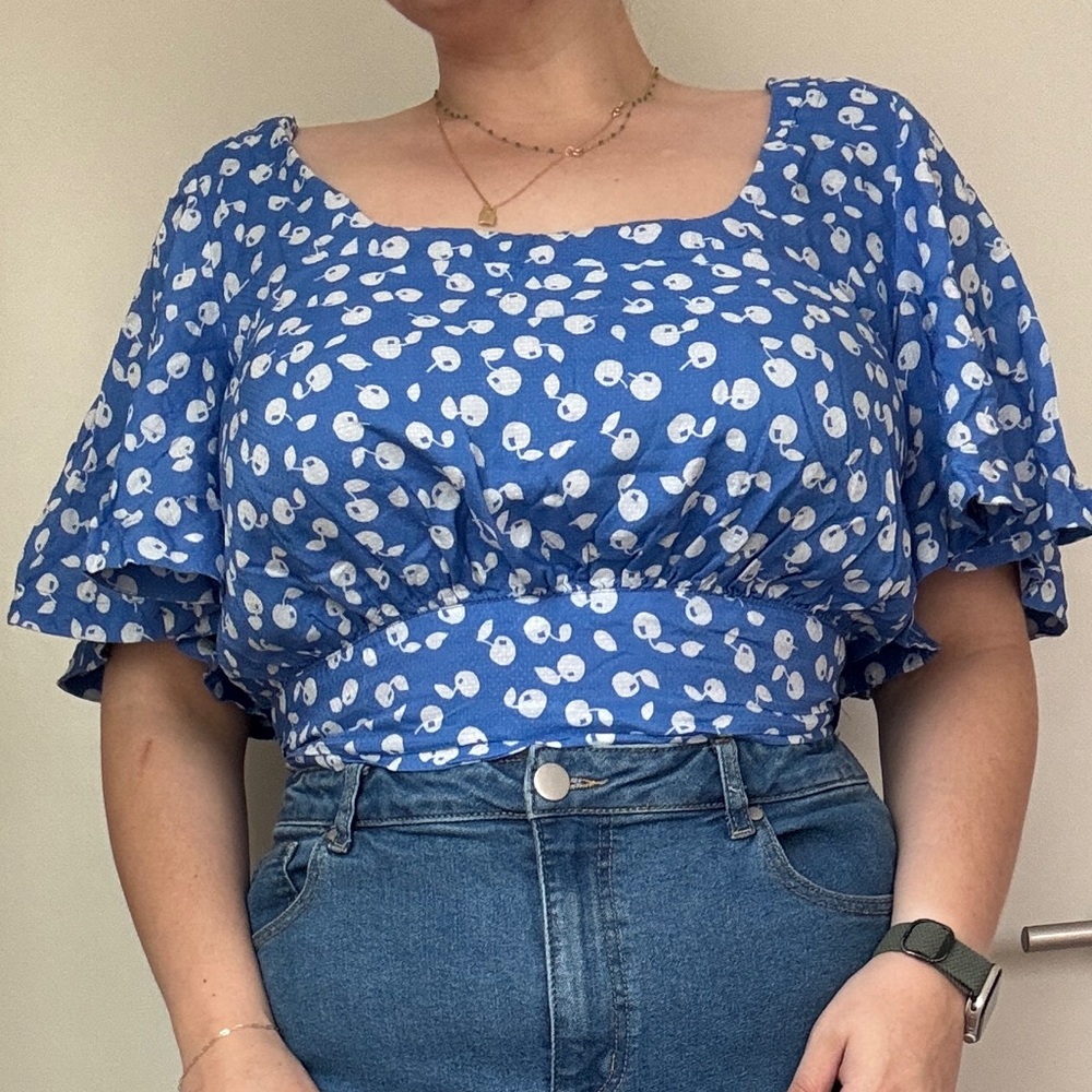 Anthropologie Blue Ruffled Tie Open Back Crop Blouse